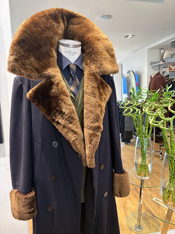 Navy blue double breasted great coat with a fur collar